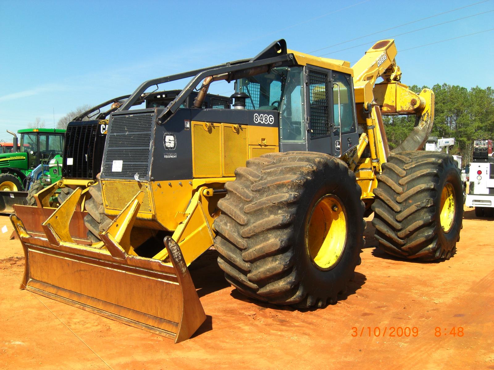 John Deere Skidder | www.galleryhip.com - The Hippest Pics