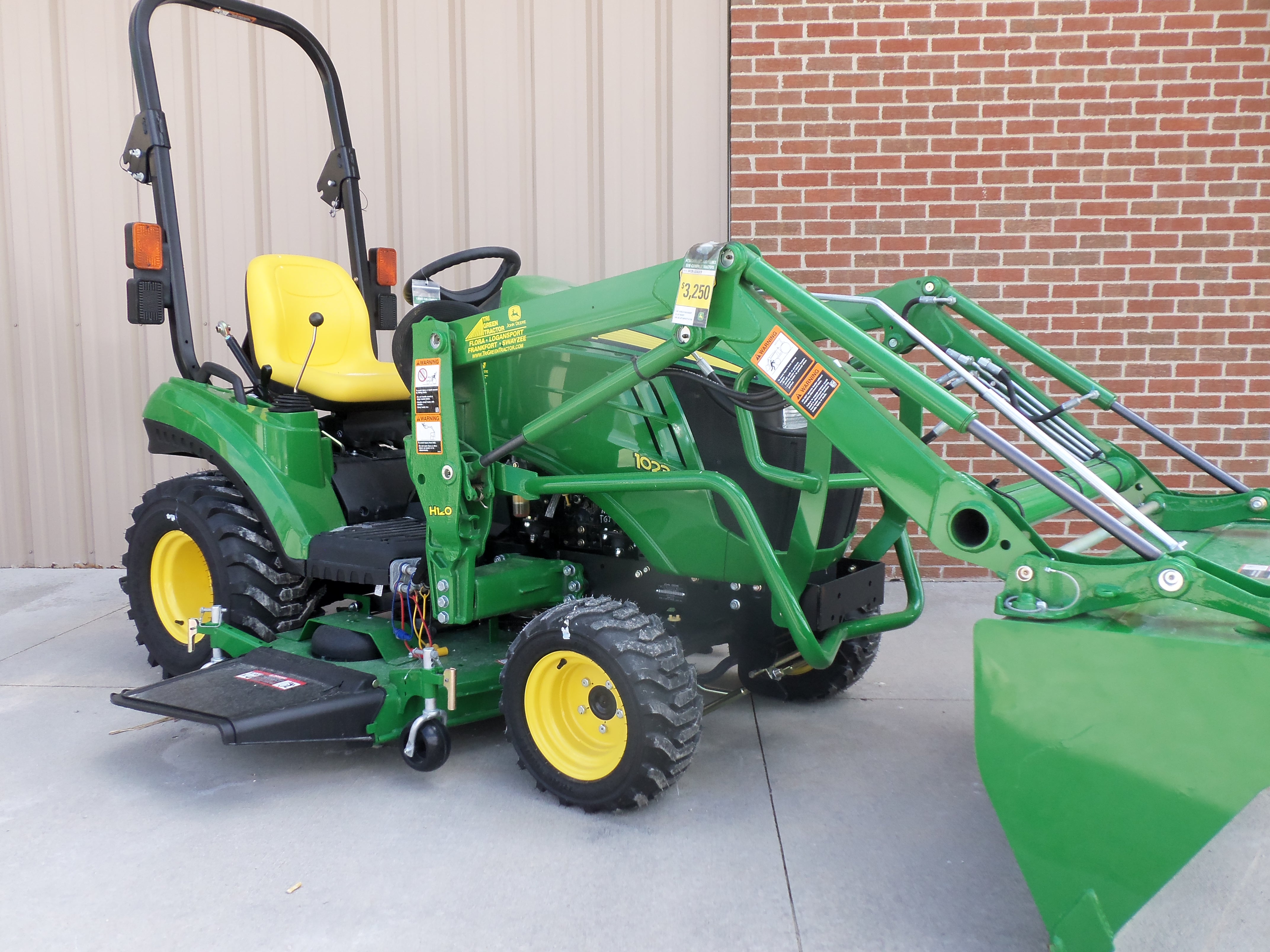 John Deere 1023E with H120 loader | Tri Green Tractor in Flora | Pin ...