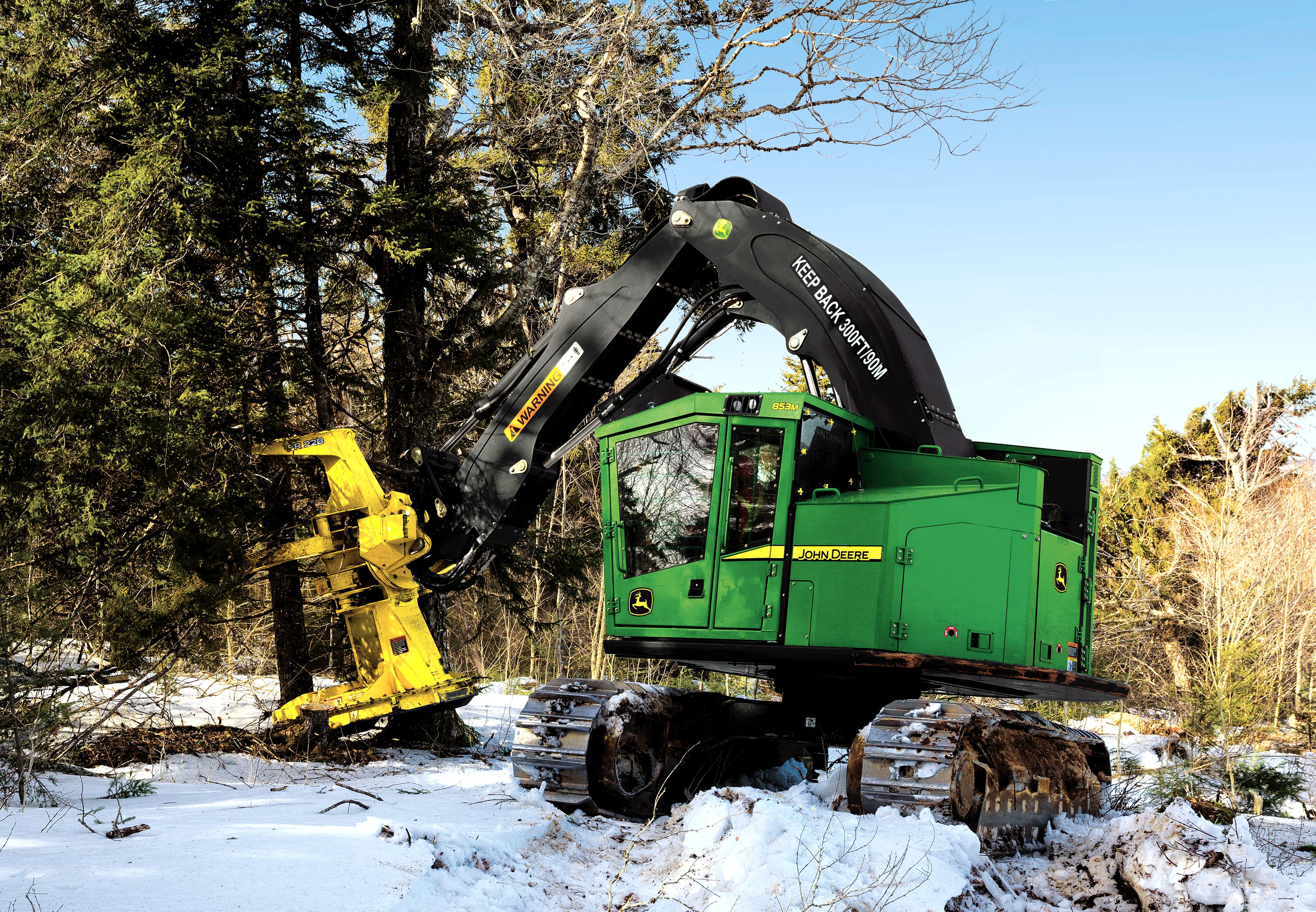 John Deere Feller Buncher with FR22B Felling Head chopping down a tree ...