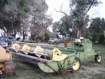 JD 215A Self Propelled Windrower Year Unkown - TractorShed.com