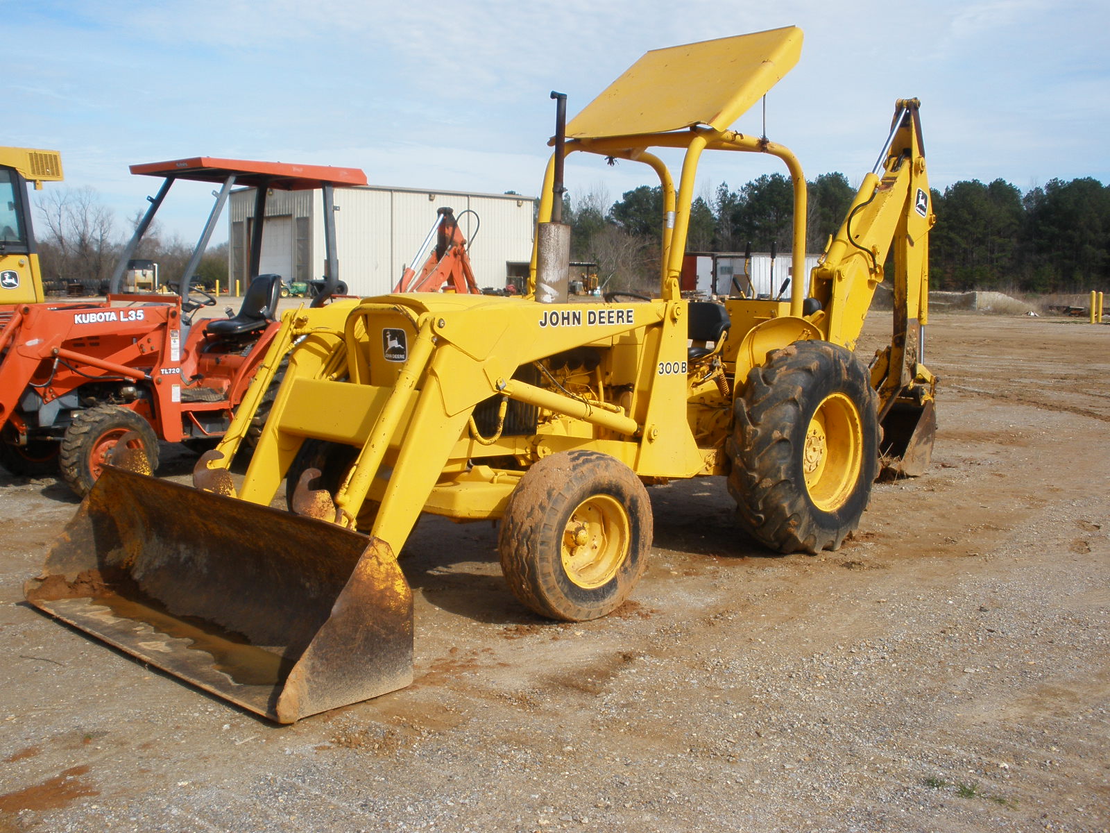 John Deere 300B Backhoe Specifications submited images.