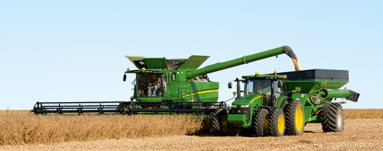 Combine unloading grain into Grain Tank