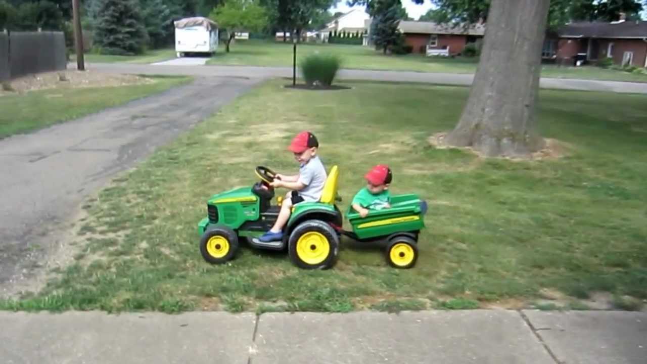 Kids riding John Deere tractor - YouTube