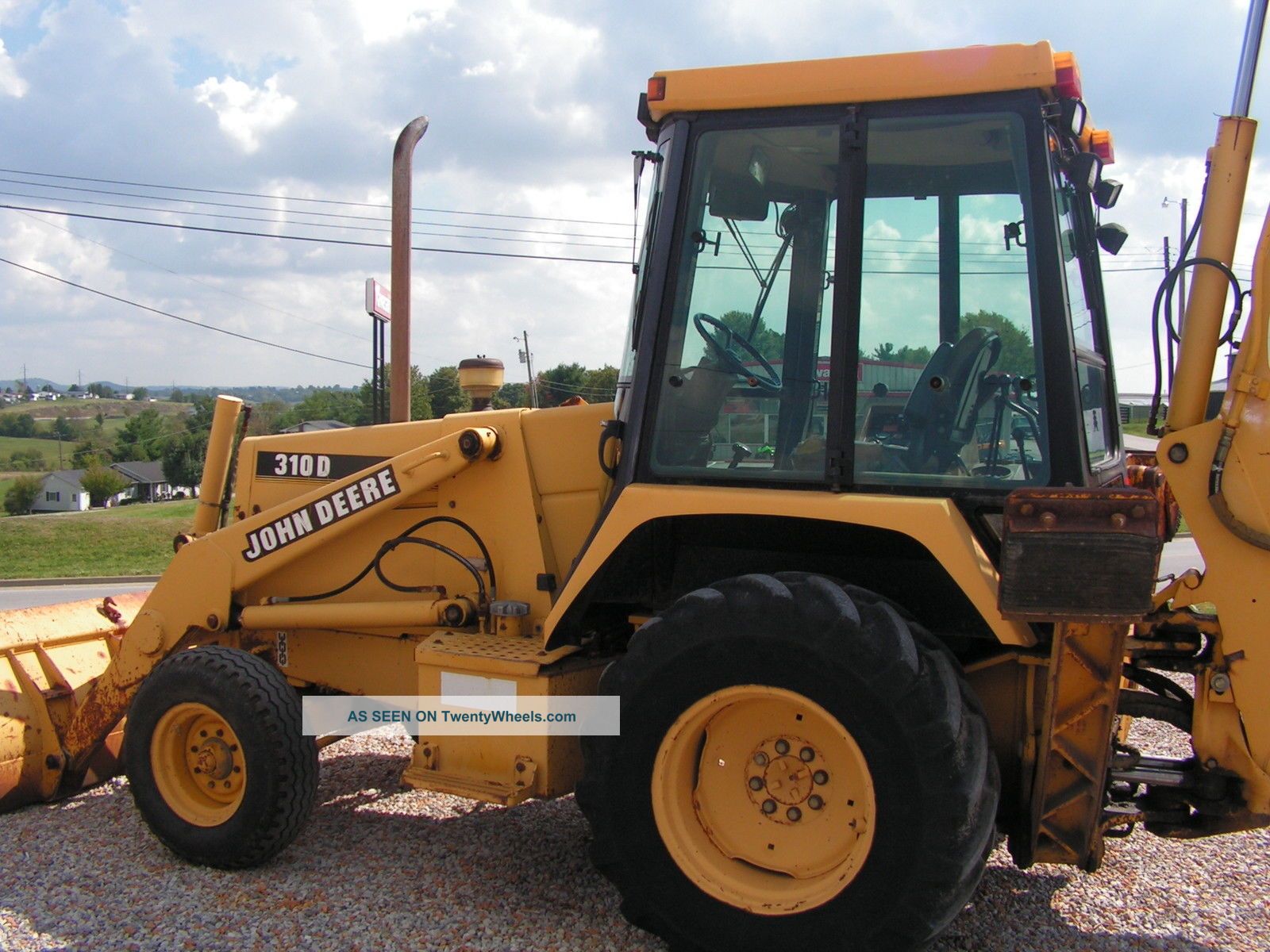 John Deere 310 D Backhoe