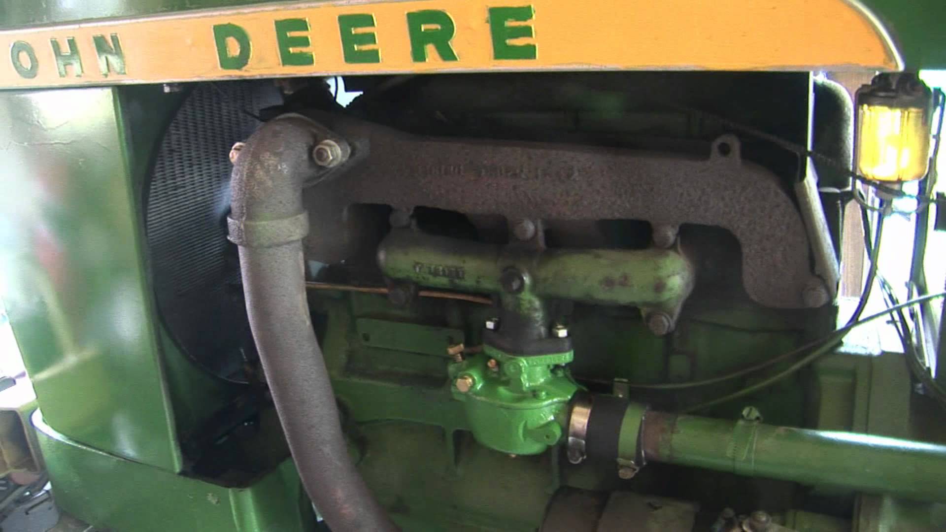 John Deere 1010 with New Carb - YouTube
