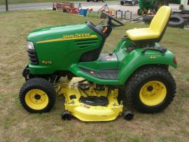 Transport a John Deere X575 garden tractor to Independence