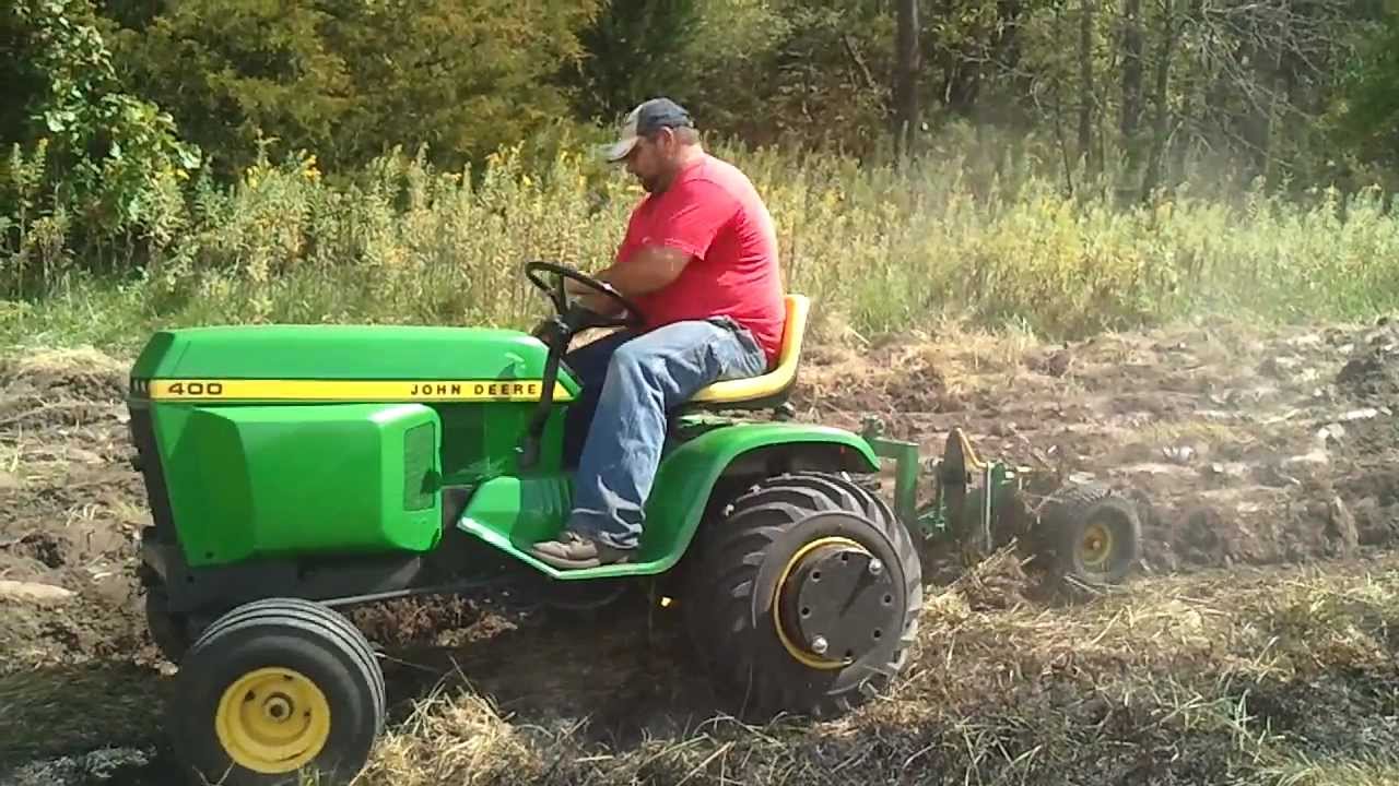 john deere 400 plowing sod - YouTube