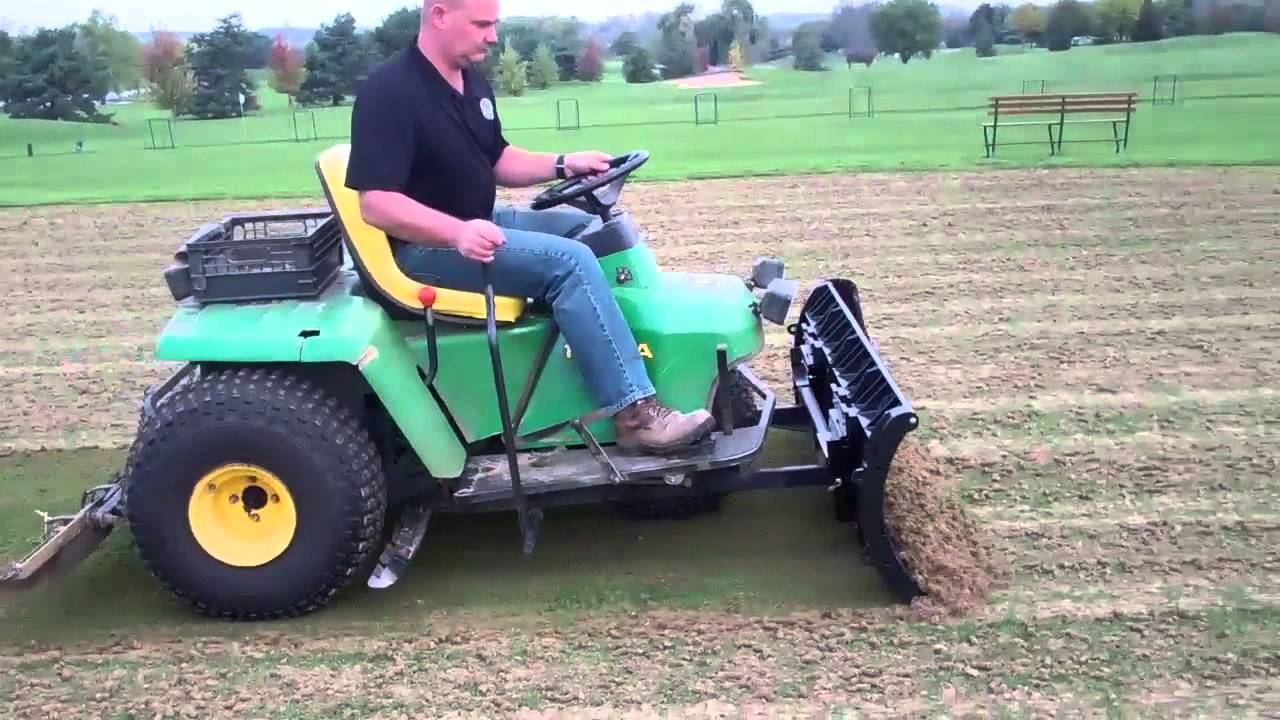 Deere 1200A clearing core plugs with Nordic Plow - YouTube