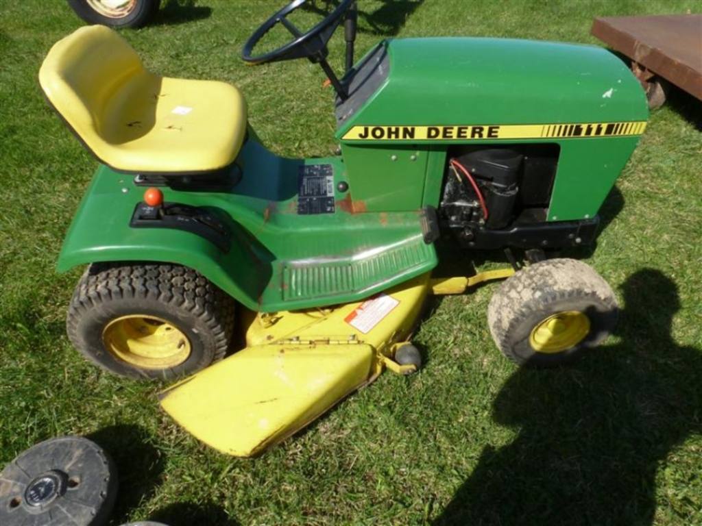 John Deere 111 riding mower, 36'' cutting deck, Briggs & Stratton 11hp 4-cycle engine, some ...