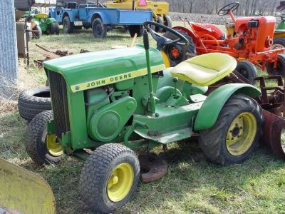 110 John Deere with bar tires and snow blade | #473081