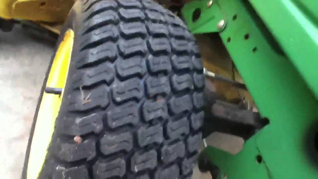 New front tires for the John Deere 345 - YouTube
