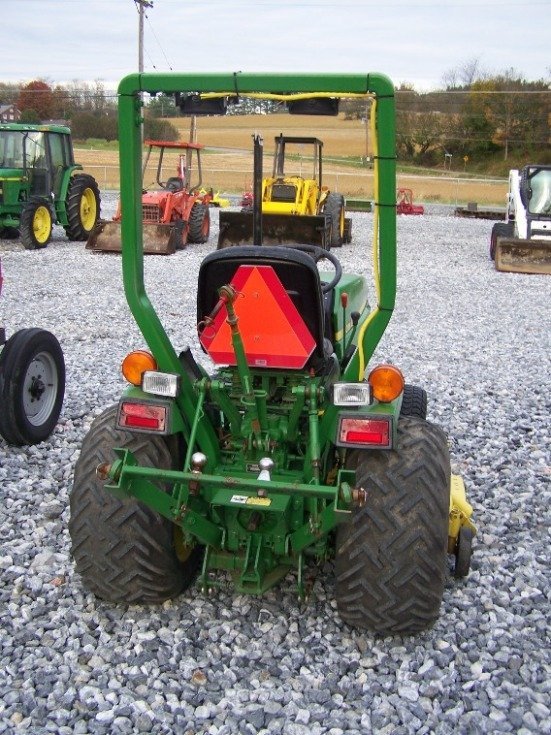 1338: John Deere 670 4x4 Compact Tractor : Lot 1338