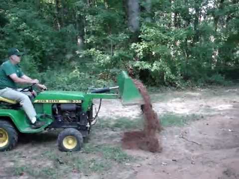John Deere 332 With Buford Bucket Moving Dirt - YouTube