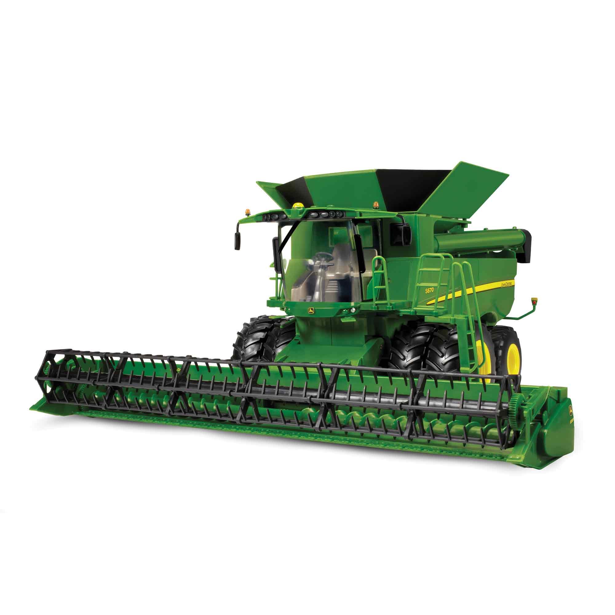 The grain head rotates when this John Deere S670 Combine is pushed ...