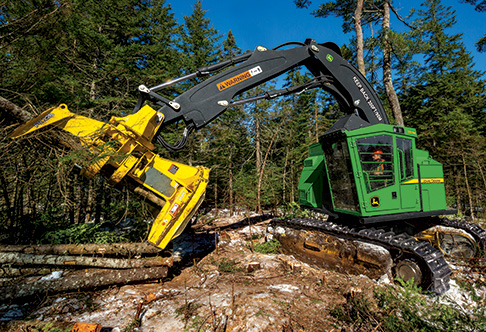 Left hand side view of the 853M with a FR22B felling head traveling up ...