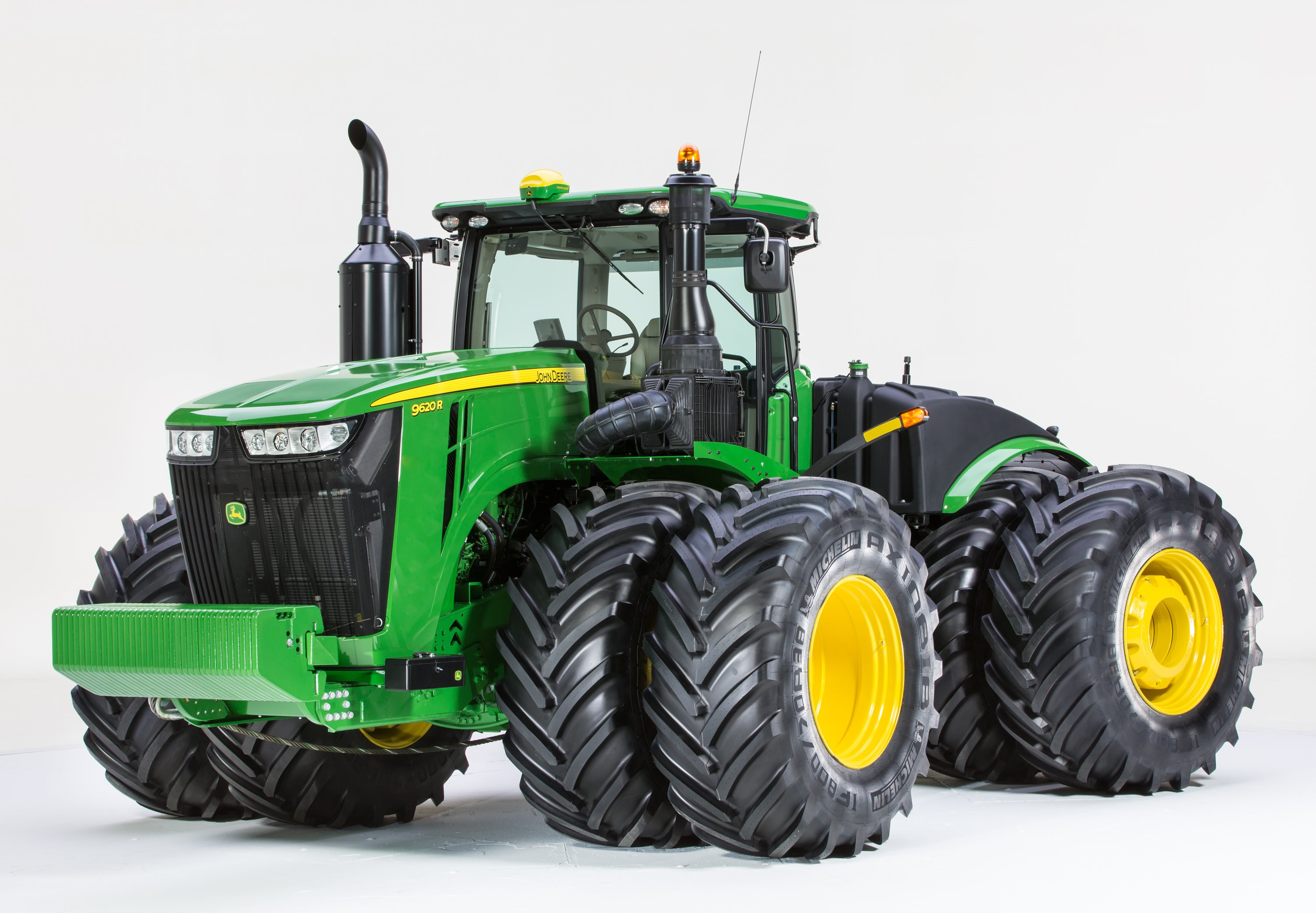 ... the front view of a John Deere 9620R tractor with composite fuel tank
