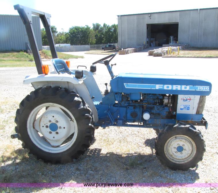 E4506E.JPG - Ford 1510 MFWD tractor, 612 hours on meter, Ford K773 ...