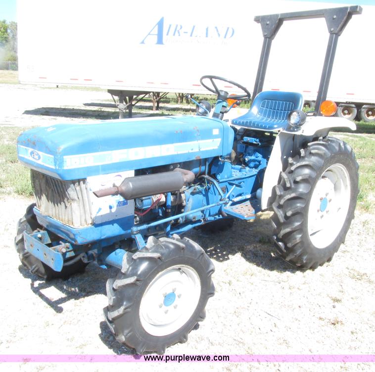 E4506.JPG - Ford 1510 MFWD tractor, 612 hours on meter, Ford K773 ...
