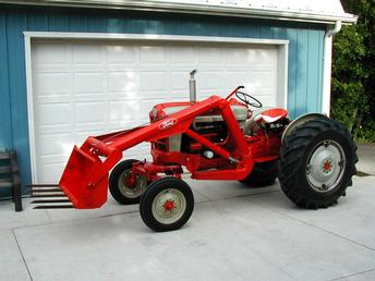 Ford 981 with 1700 original hours and restored 711 loader.