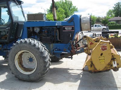 Ford New Holland 9030 with triple flail mower. This view also shows ...
