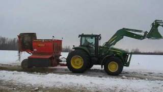 John Deere 7630 with Highline 8000 - 2 - Putting out feed.