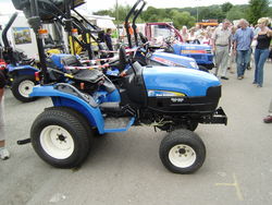 ... compact garden tractor from New Holland with 2 Iseki models behind