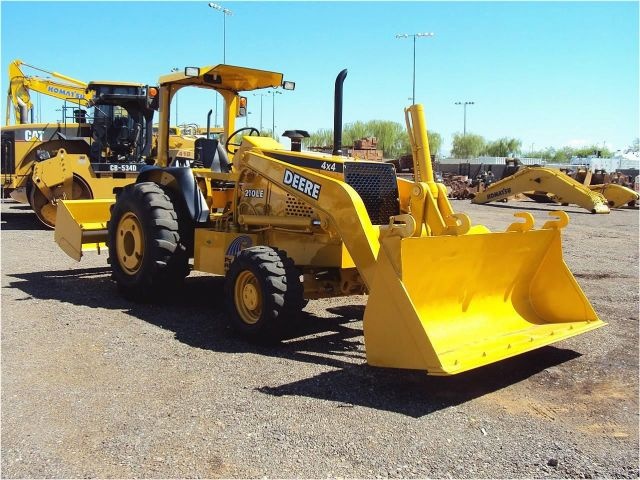 Our featured Skip Loader is a 2003 John Deere 210LE, 3,954 Hrs., OROPS ...