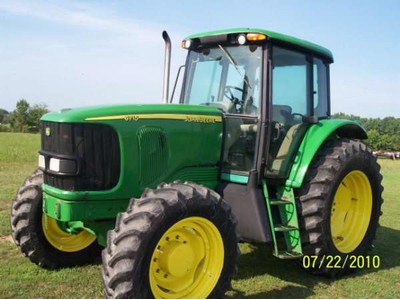 John Deere 6715 MFWD - Tractors Classifieds