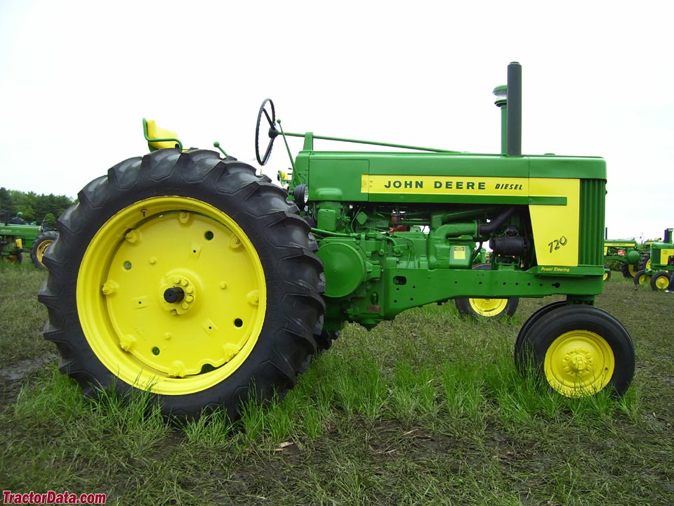 John Deere 720 diesel with Roll-a-matic tricycle front end. (3 images)