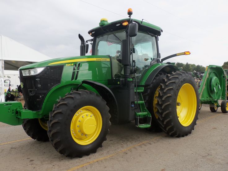 John Deere 7210R with CX15 rotary cutter leaving farm Science Review