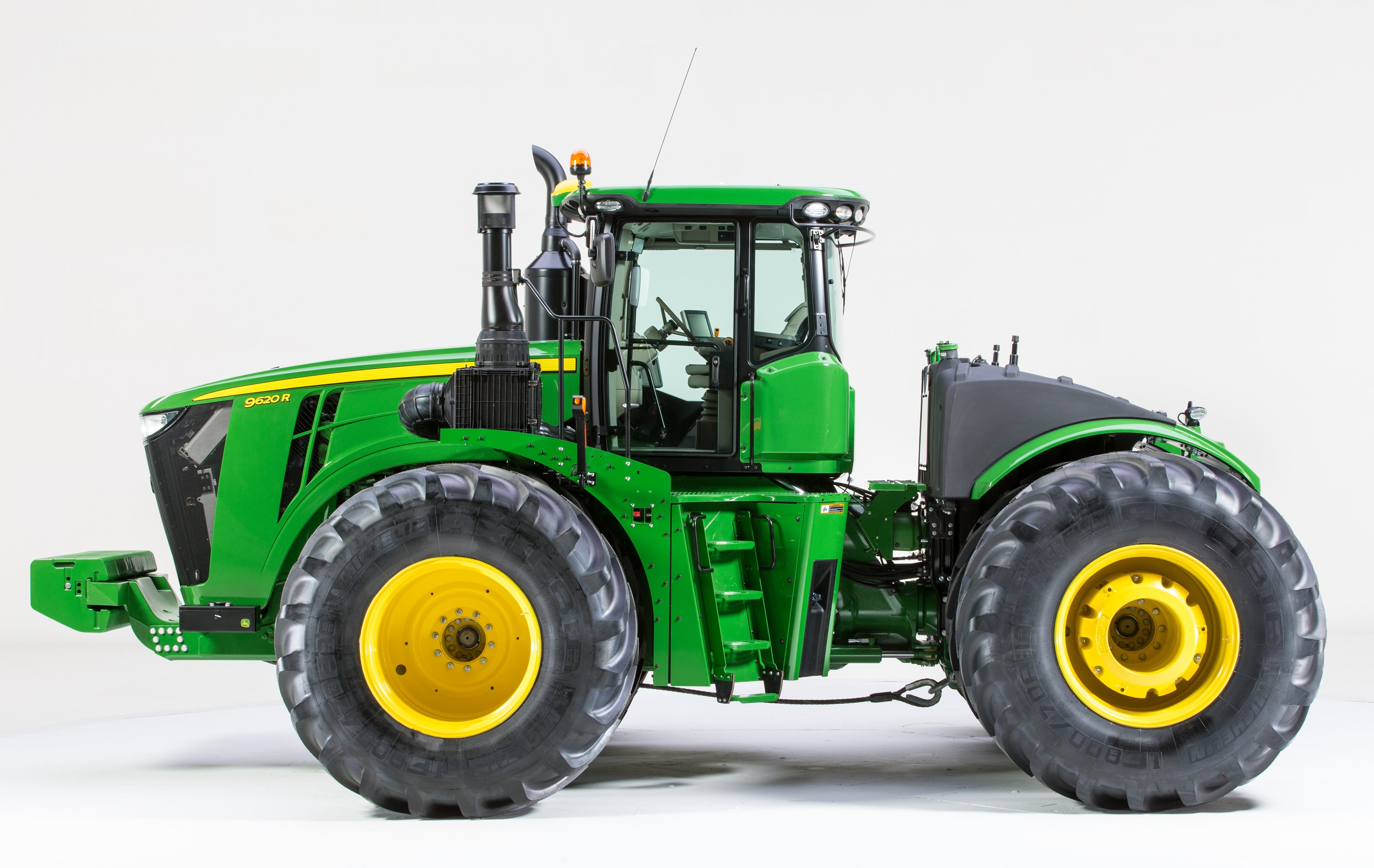 ... the side view of a John Deere 9620R tractor with composite fuel tank