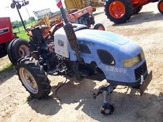 Lenar LE200 tractor salvaged for used parts. Call 877-530-4430. We buy ...