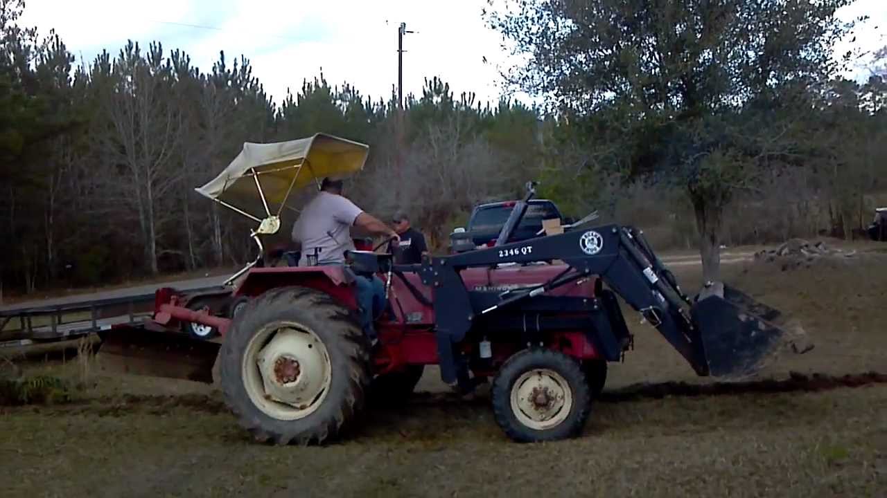 Mahindra 450 Tractor with Back Blade Cutting a Trench - YouTube