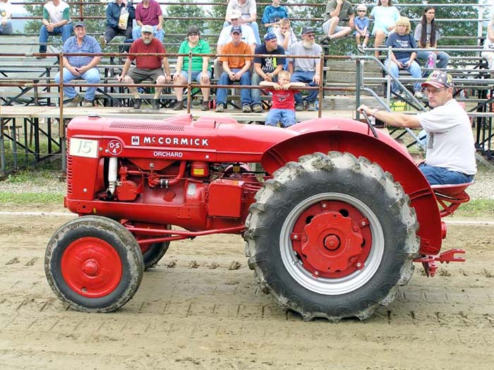 1948 McCormick Deering 0S-4 orchard tractor driven by Fred Miller of ...