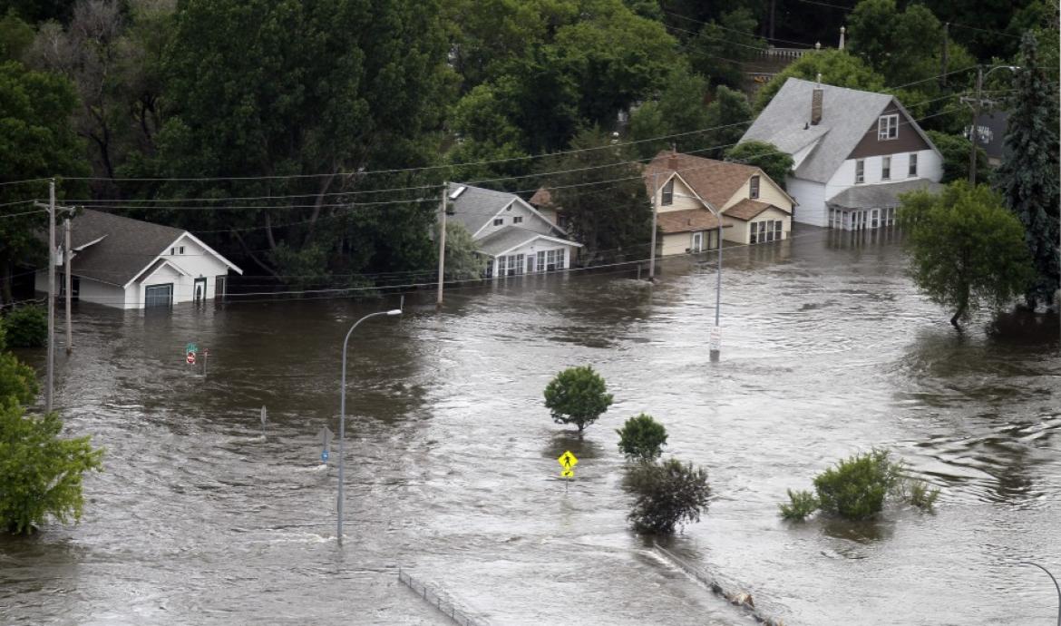 Houses in Minot, North Dakota are lost to floods as the Souris River ...