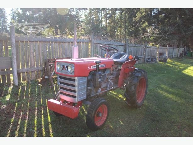 ... needed $6,000 · OBO Mitsubishi Farm Tractor R1500 and 6 implements