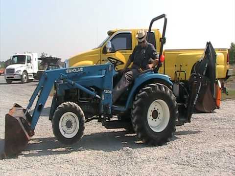 New Holland 1530 Tractor with Backhoe - YouTube