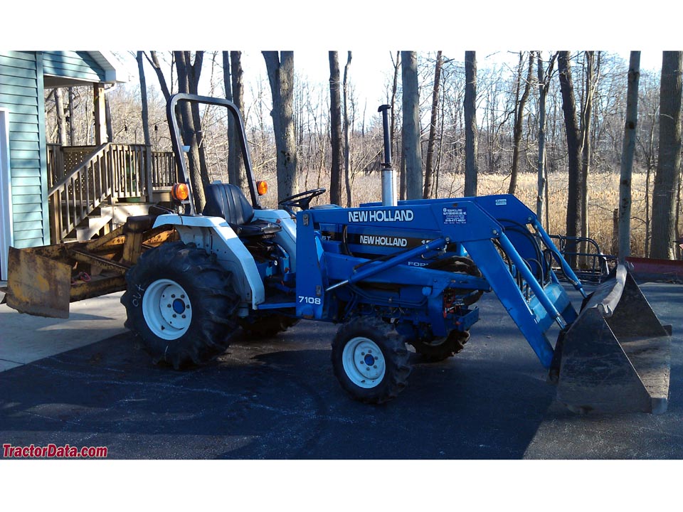 New Holland 1620 with box blade and model 7108 loader. Photo courtesy ...