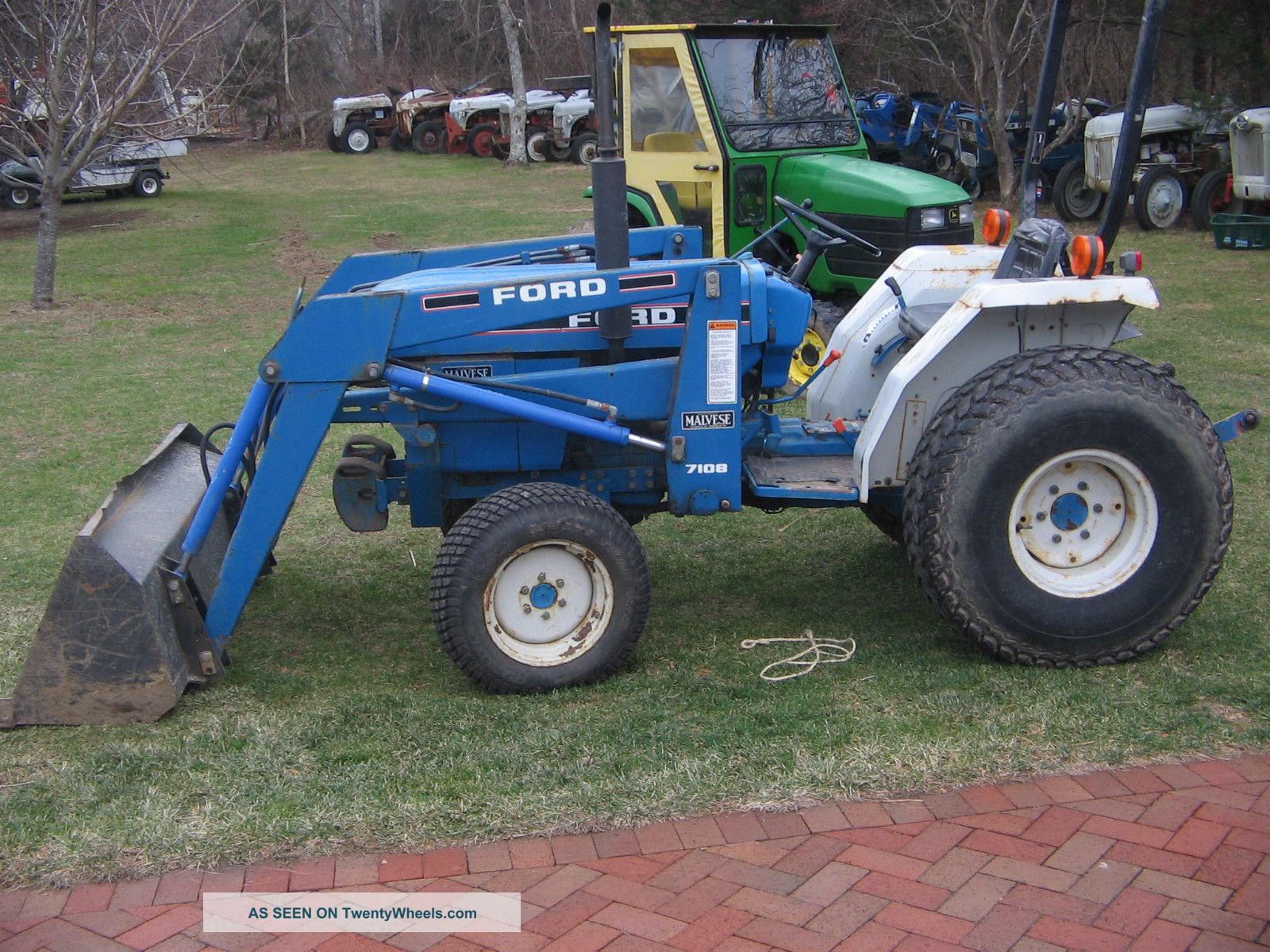 Ford New Holland 1715 Front Loader 4wd Tractors photo 1