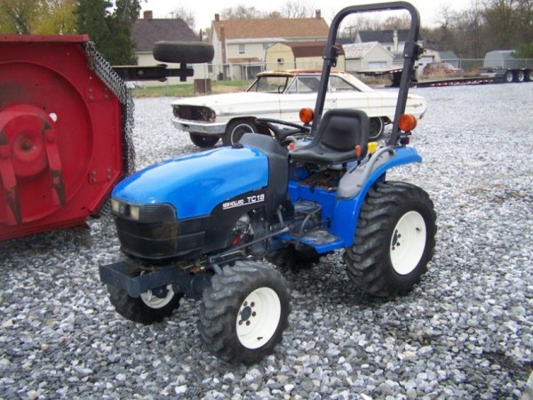 136: New Holland TC18 4x4 Compact Tractor : Lot 136