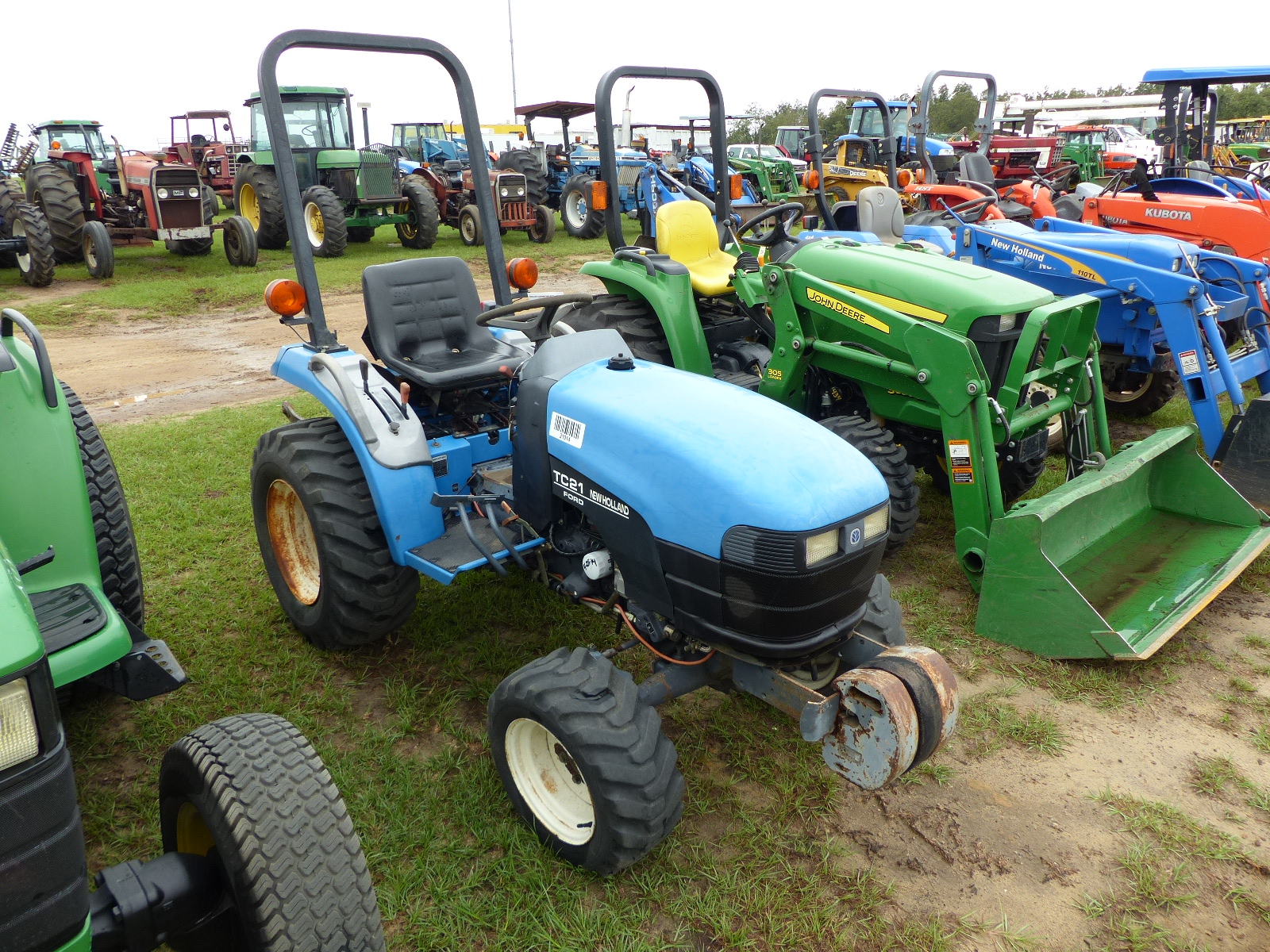 ID#:3910 NEW HOLLAND TC21 TRACTOR, OPEN, 4WD, FRONT WEIGHTS Mileage ...