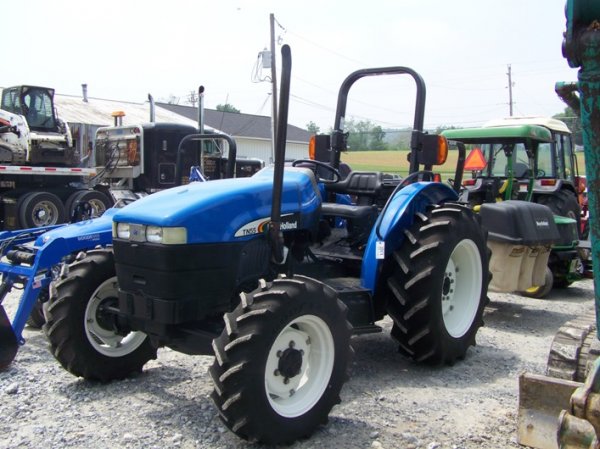 1345: New Holland TN55 4x4 Farm Tractor Like New