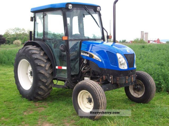 2012 New Holland TN75DA Agricultural vehicle Tractor photo 1