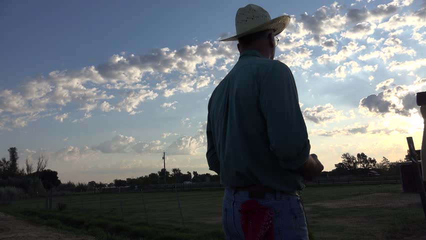 Cowboy Ranch Hand Working On The Fences Sunrise To Sunset. Man Using ...