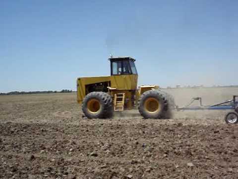 475C Rome tractor and DMI field cultivator 2009 - YouTube