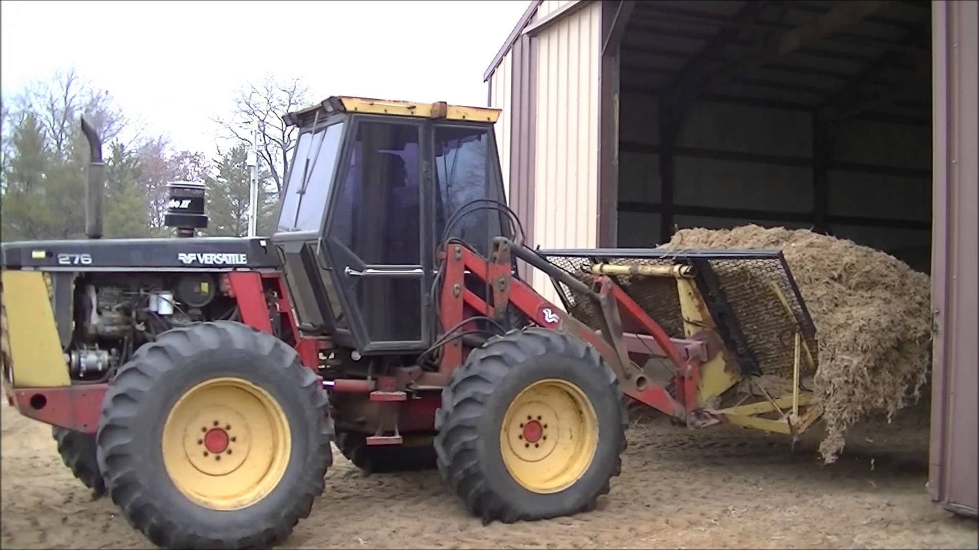 ... fo Dry Moss into the Shed with the Versatile 276 Tractor - YouTube