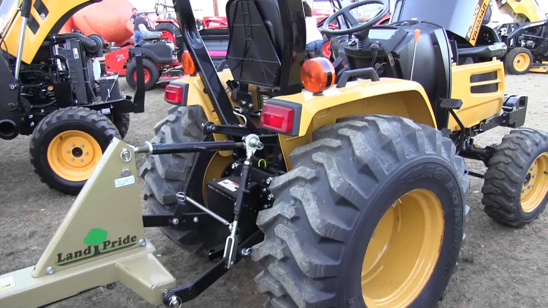 Yanmar EX3200 Tractor and Land Pride rake - YouTube