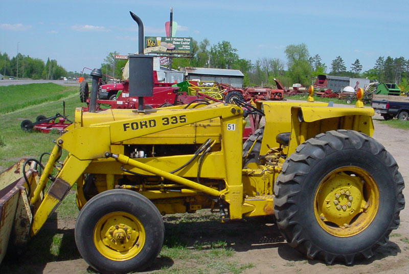 FORD 335 DIESEL with LOADER AND 2 BUCKETS