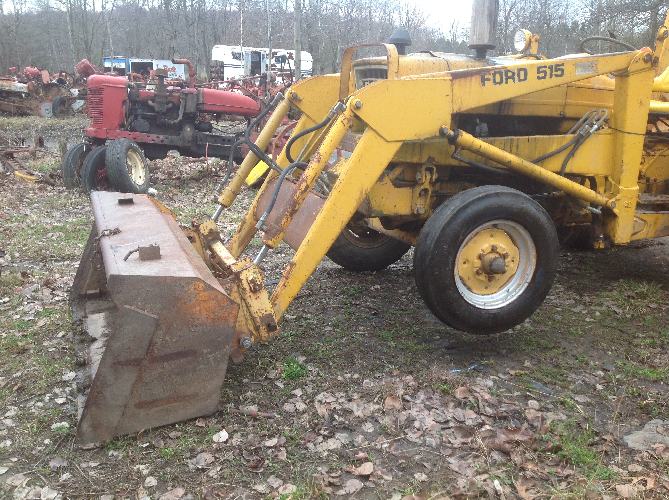 Ford model 515 industrial tractor with loader, diesel engines-smokes ...