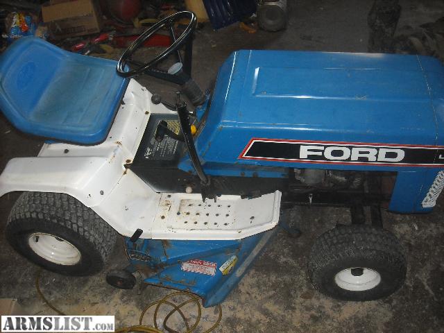 have a Ford LT 12 lawn tractor I would like to trade for a rifle ...
